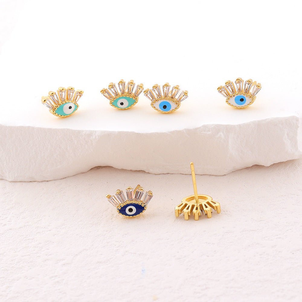 Boucles d'oreilles œil protecteur en cristal doré - Biloria