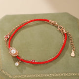 Bracelet Cordon Rouge et Perle : protection et élégance Feng Shui - Biloria